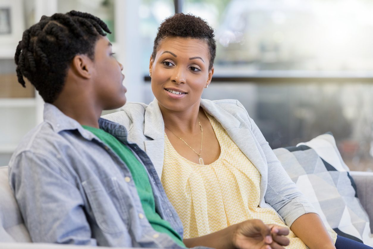 Mother and son talking