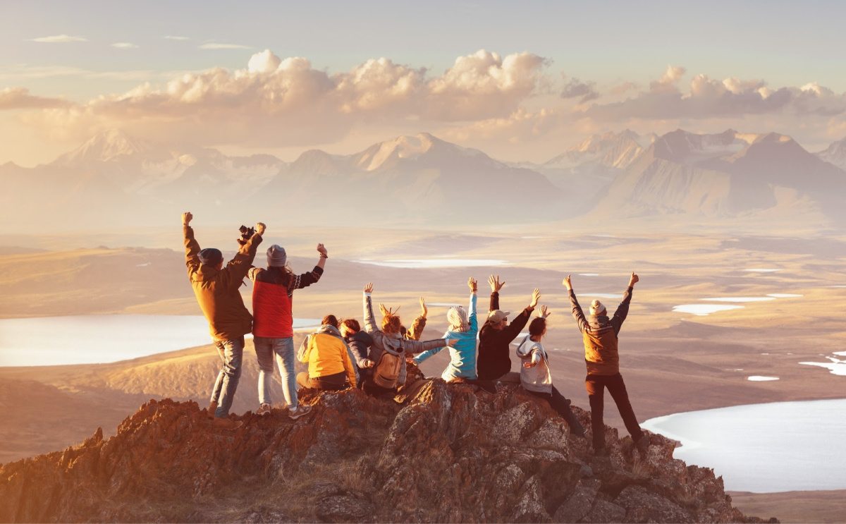 Group of hikers at the top of the mountain.