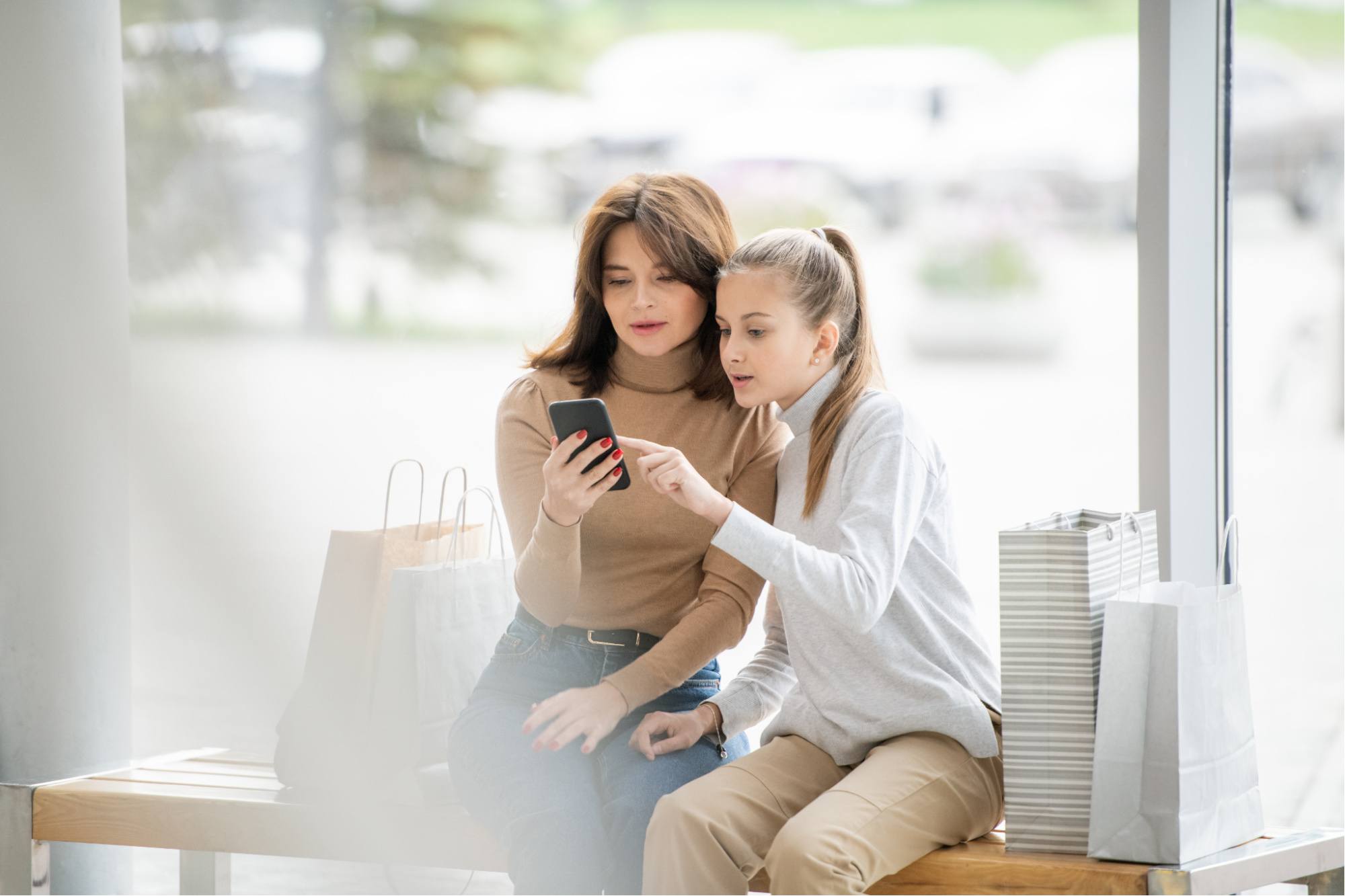 Mother and daughter shopping and talking about dressing modestly