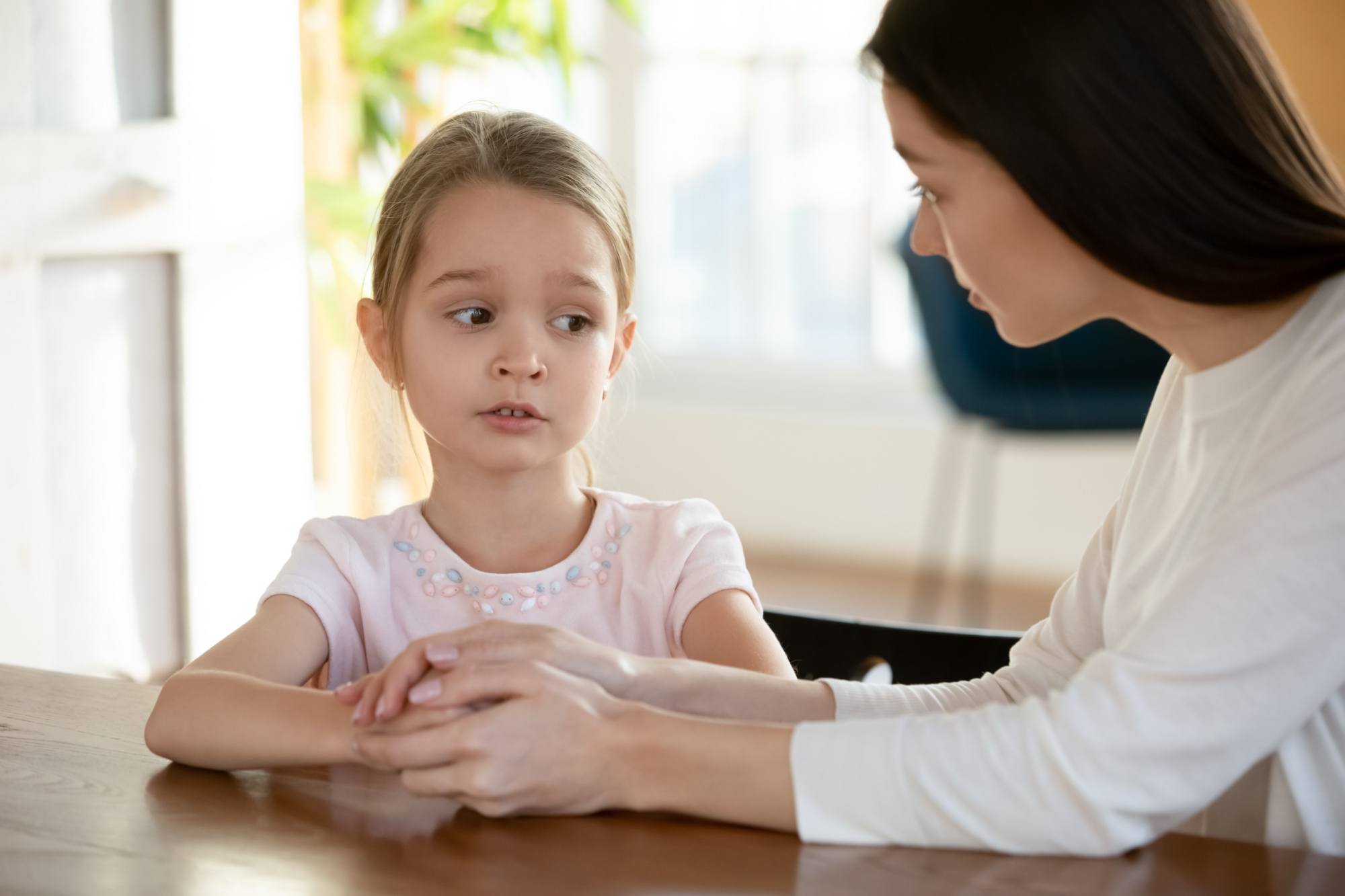 Child telling her mother why she is behaving badly.